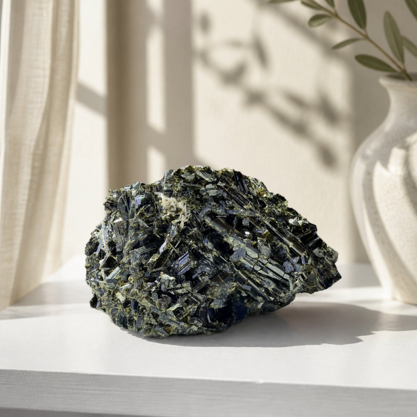 Epidote specimen with bladed green crystals