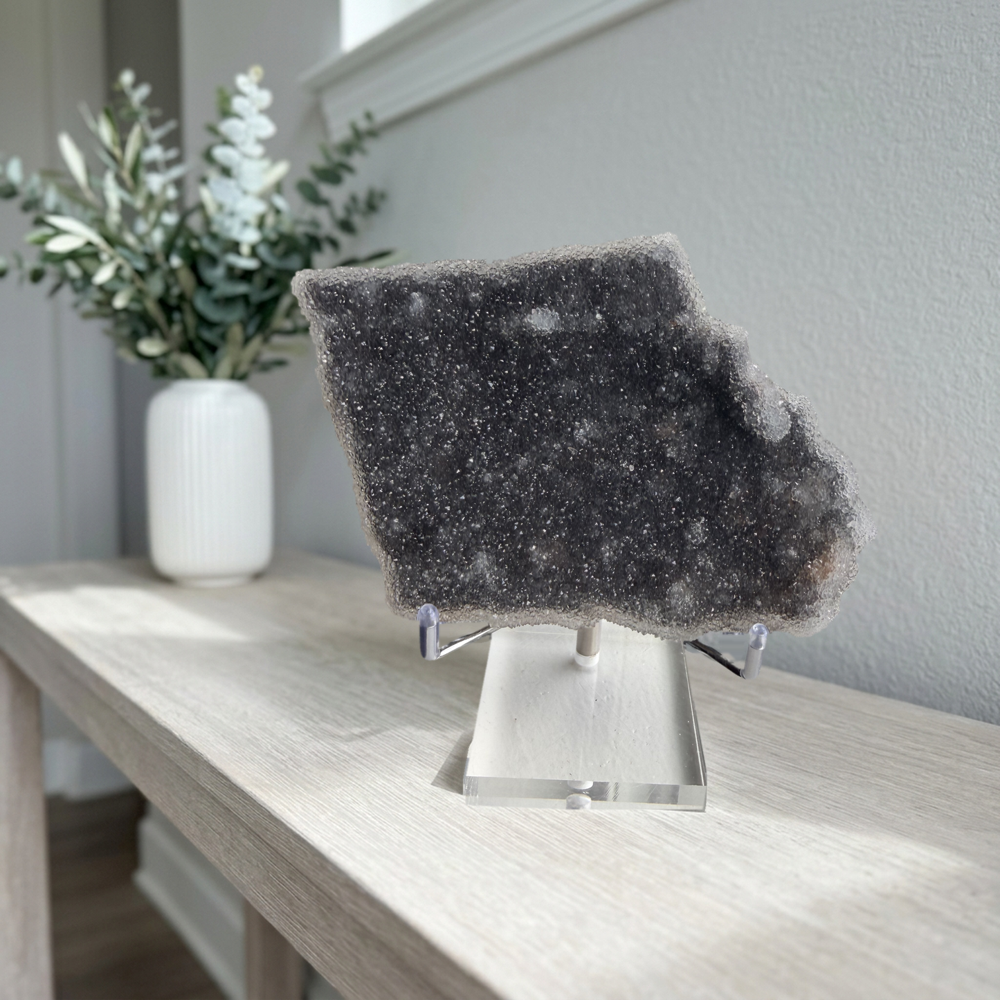 Amethyst druzy plate on a styled console