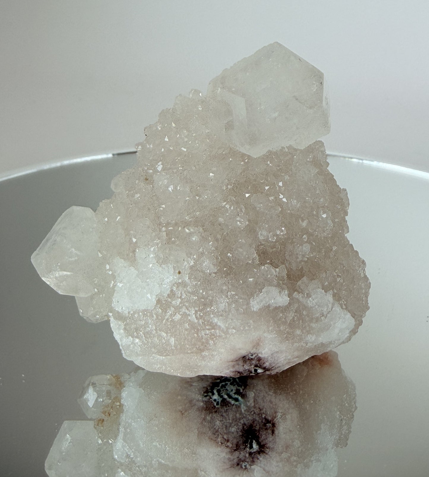 White apophyllite cluster with clear terminated crystal