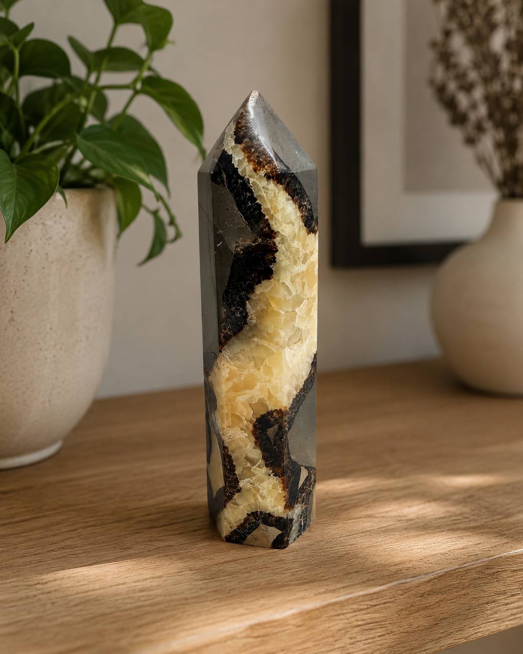 Septarian Dragon Stone Tower, lifestyle view on wood surface