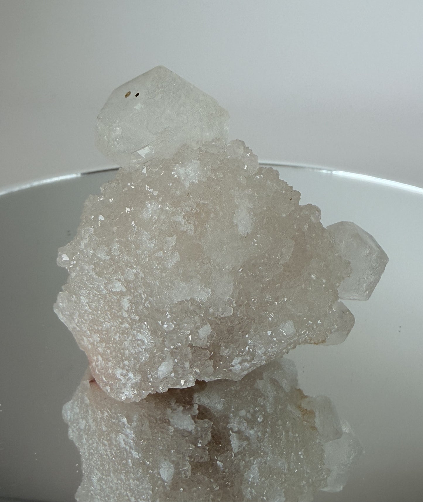 White apophyllite cluster with clear terminated crystal