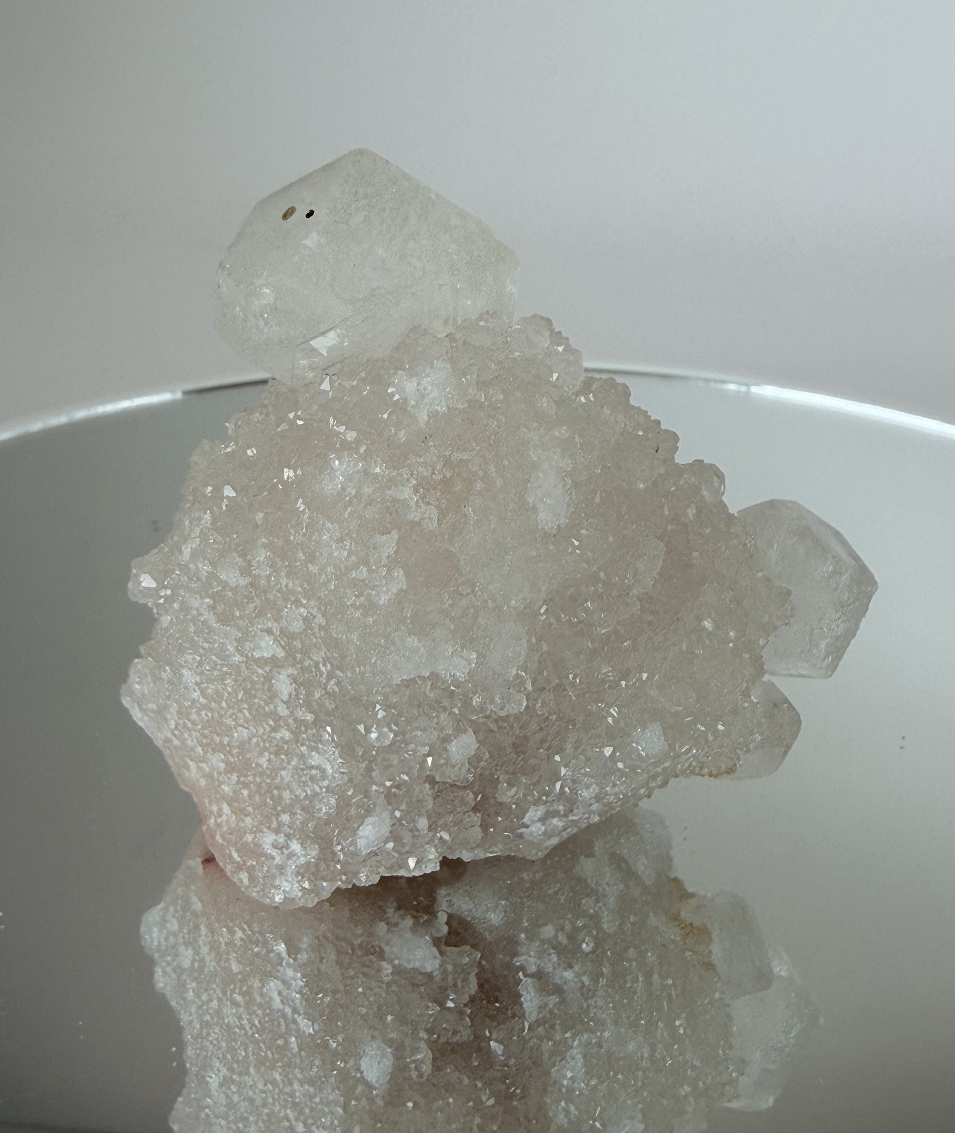 White apophyllite cluster with clear terminated crystal