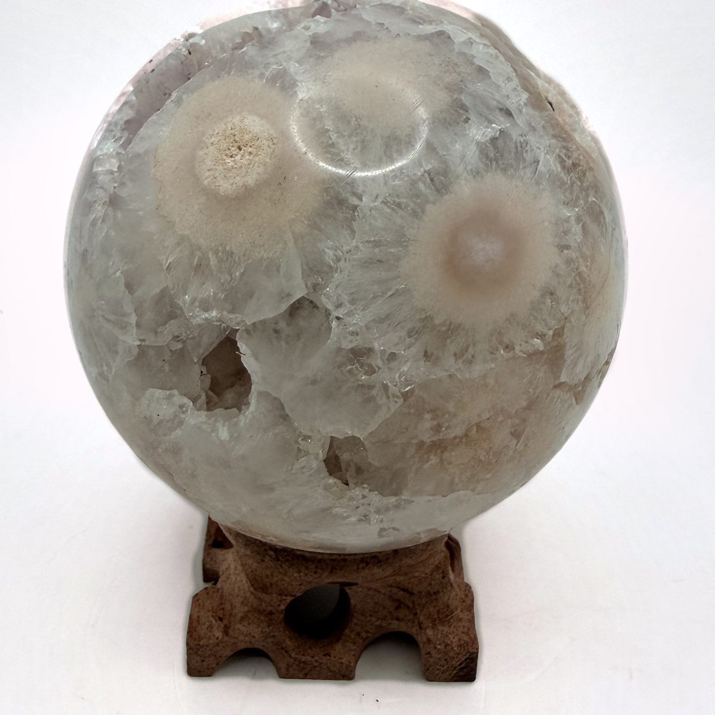 Flower agate sphere with druzy geode pocket