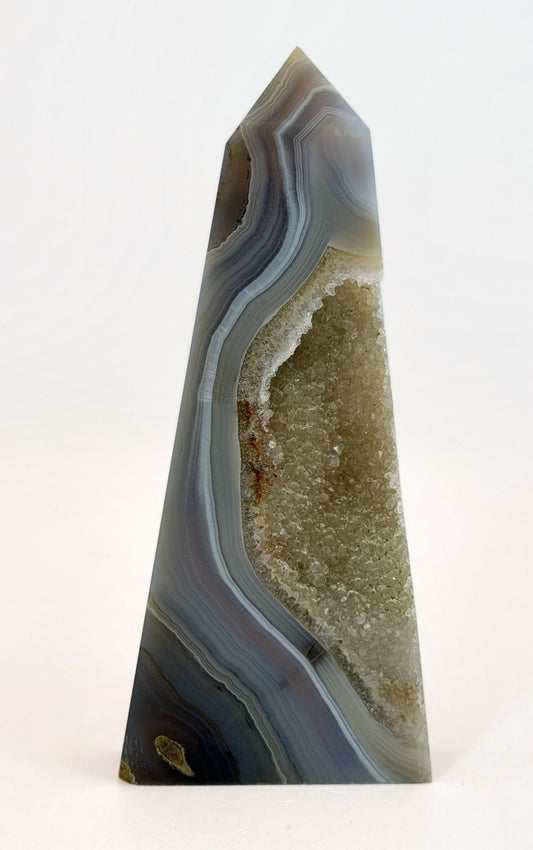 Blue banded agate obelisk with druzy quartz pocket