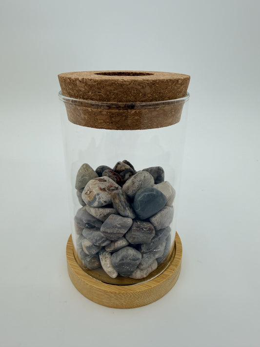 Gray toned crazy lace agate propagation station with glass vase, cork ring, and bamboo coaster