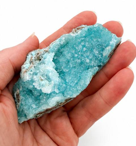Blue Hemimorphite Crystal Cluster, hand held showing aqua-blue botryoidal formations