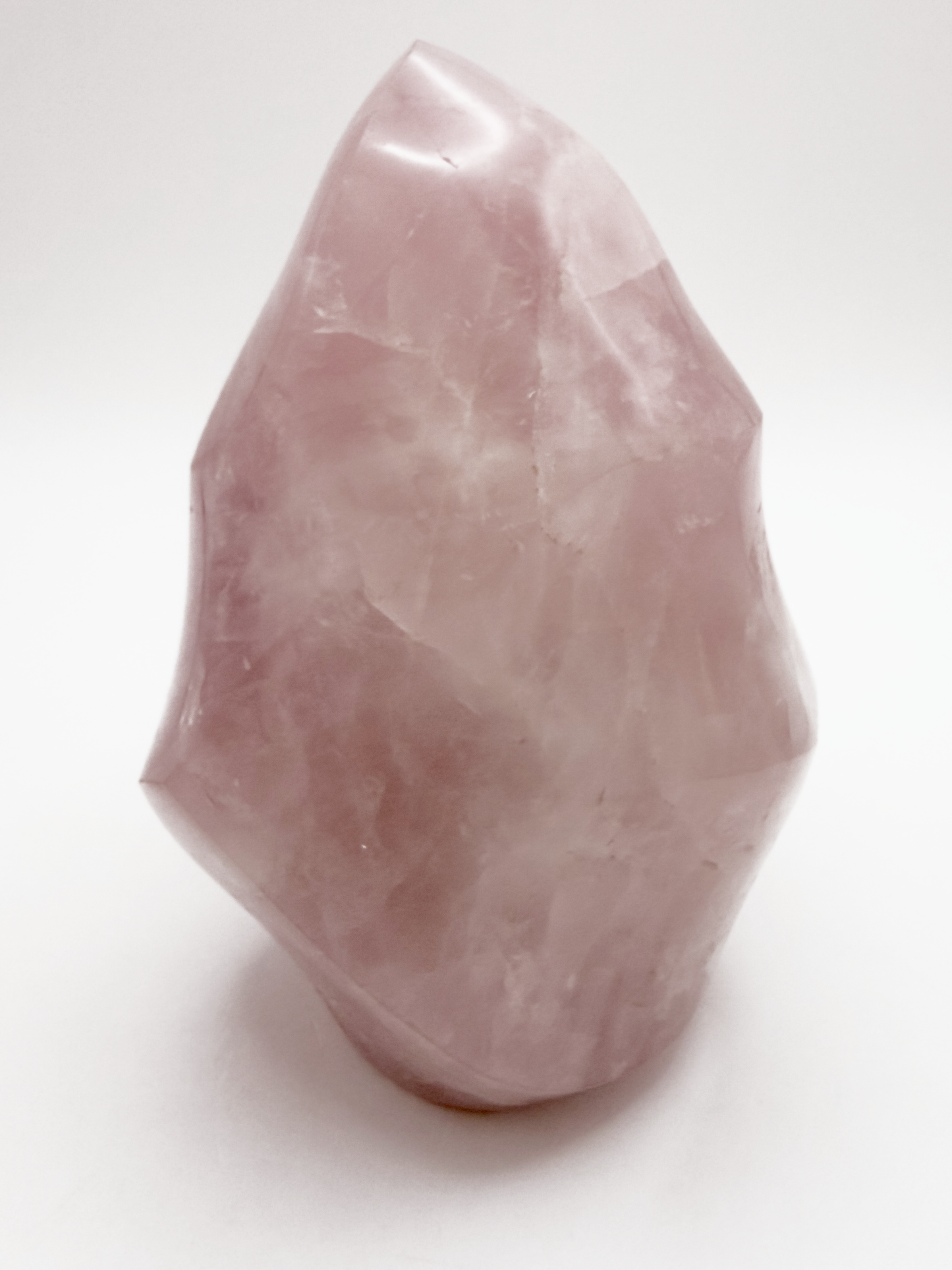 Large rose quartz flame, polished pink quartz freeform