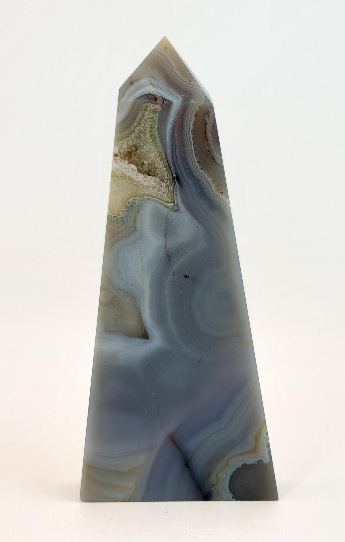 Blue banded agate obelisk with druzy quartz pocket