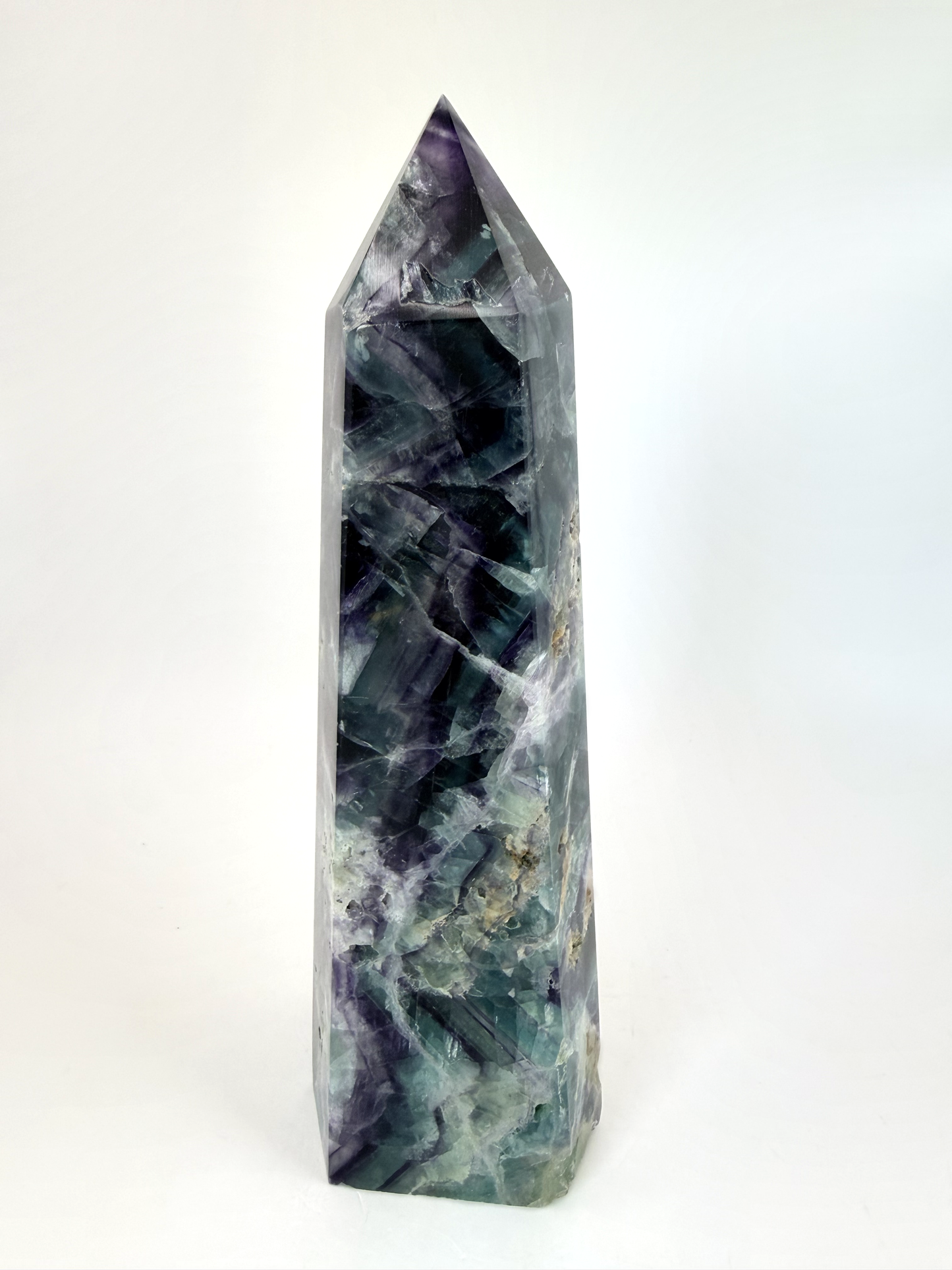 Second face showing purple and green color zoning