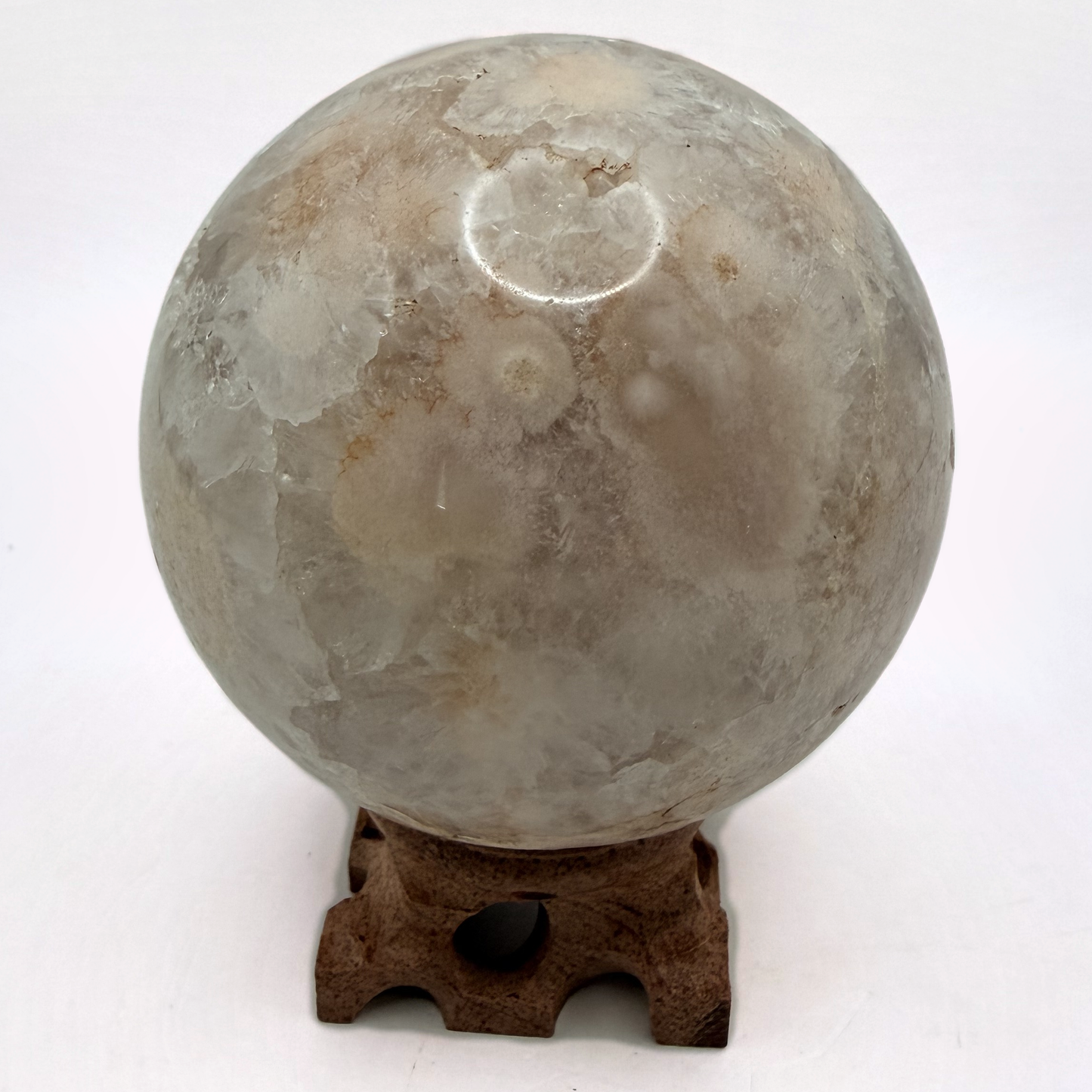 Flower agate sphere with druzy geode pocket