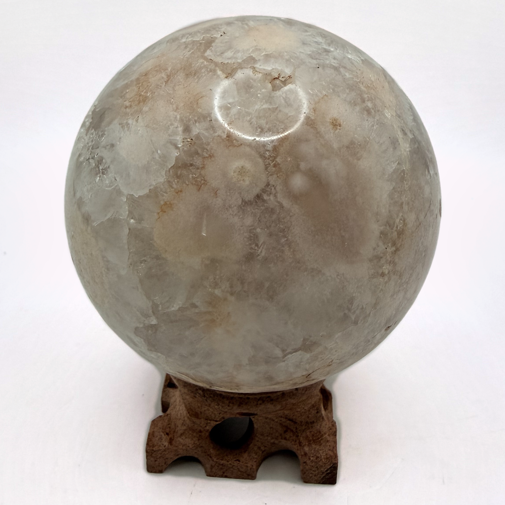Flower agate sphere with druzy geode pocket