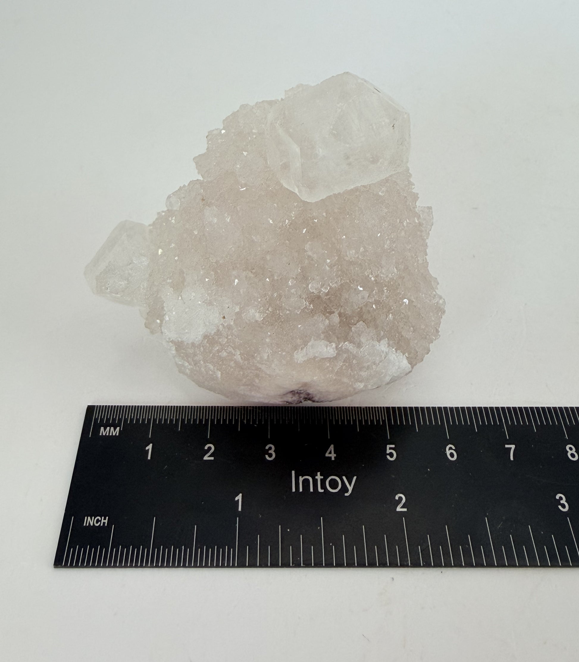 White apophyllite cluster with clear terminated crystal