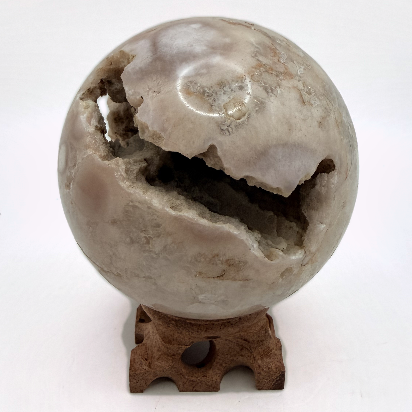 Flower agate sphere with druzy geode pocket