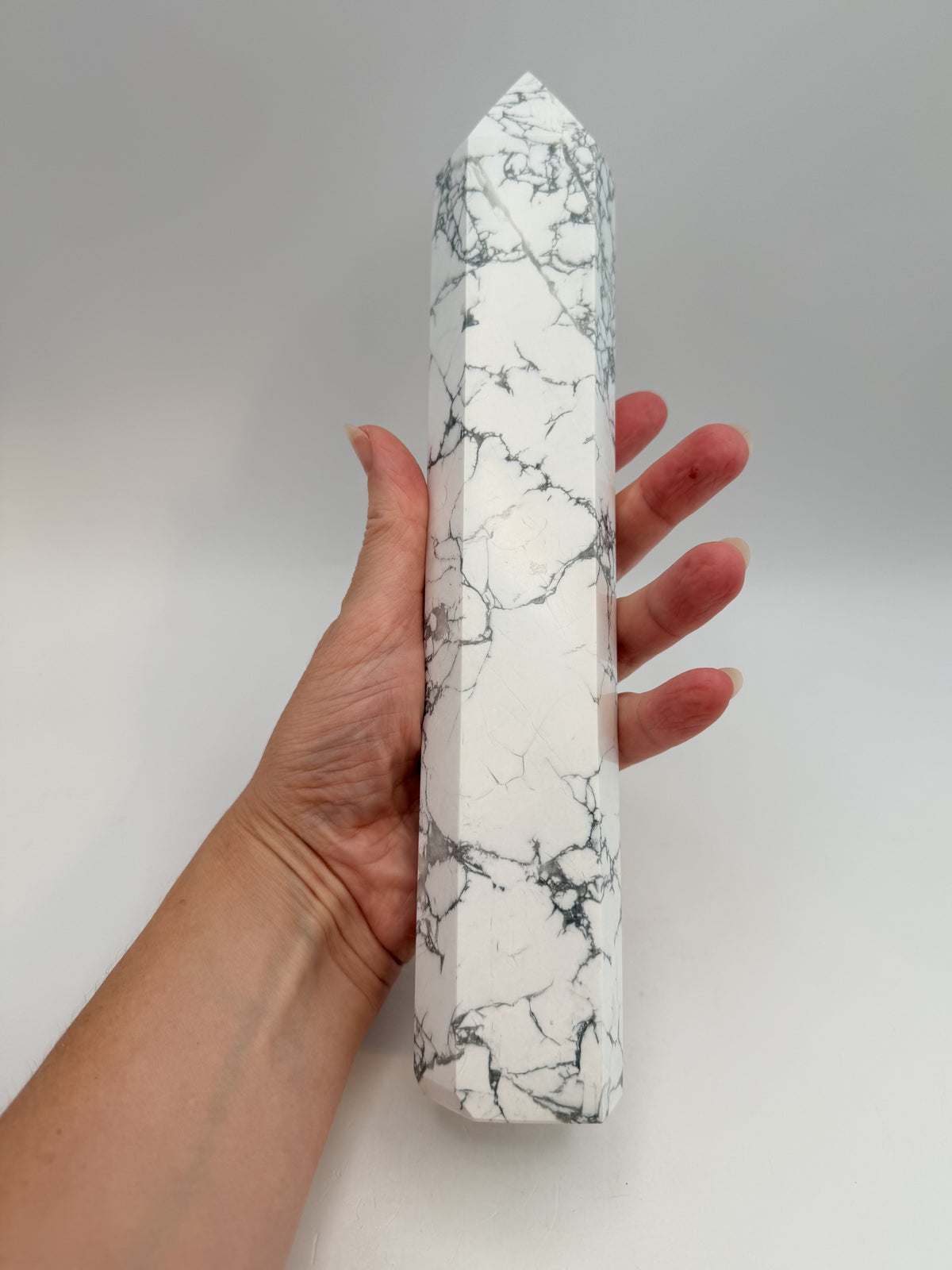 Howlite tower, in hand