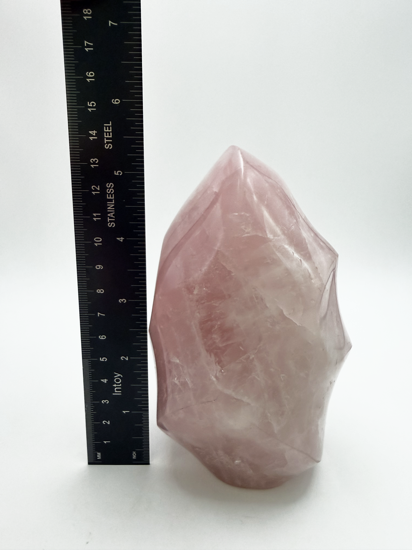 Large rose quartz flame, polished pink quartz freeform