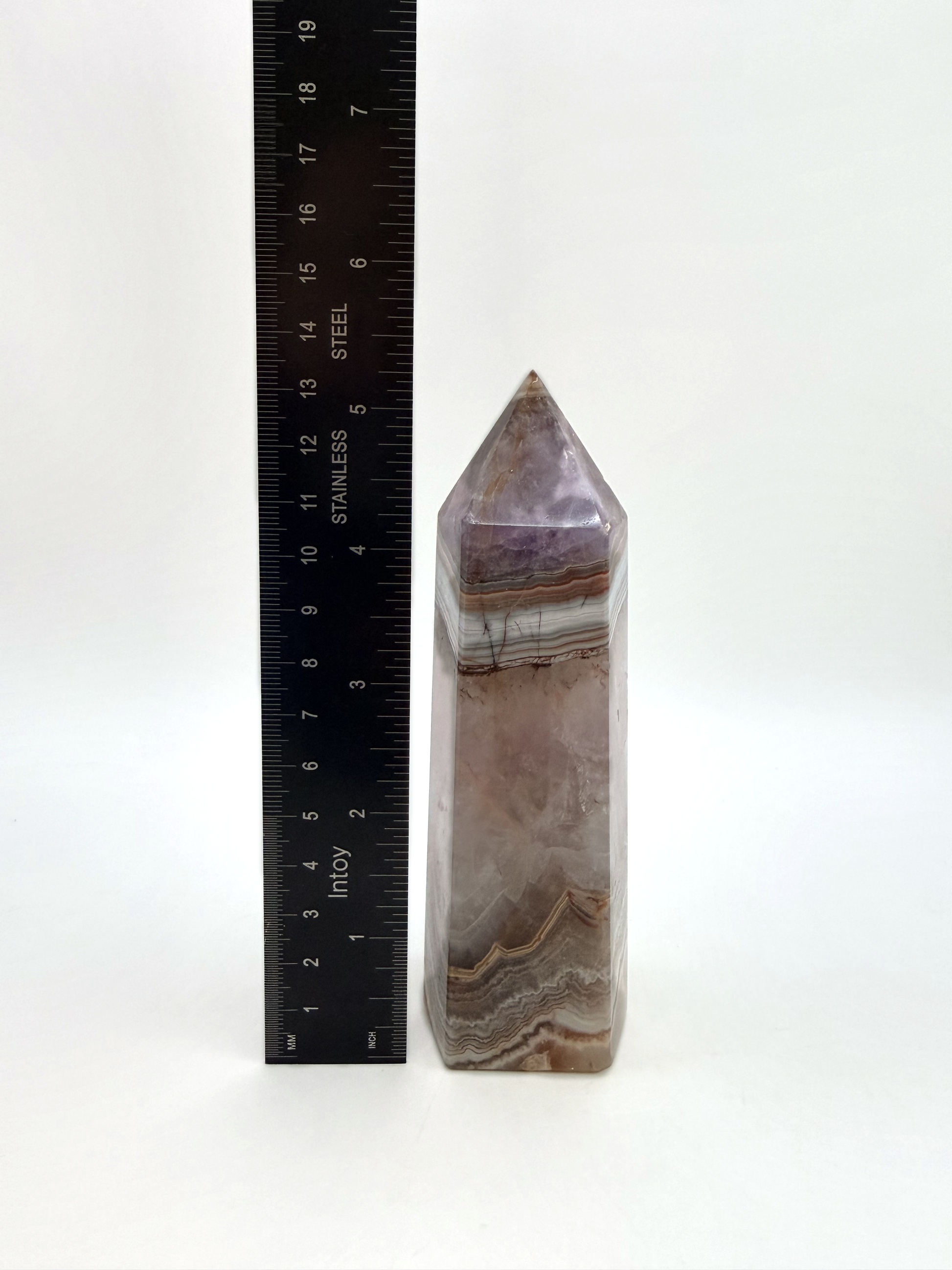 Tower beside a ruler showing height