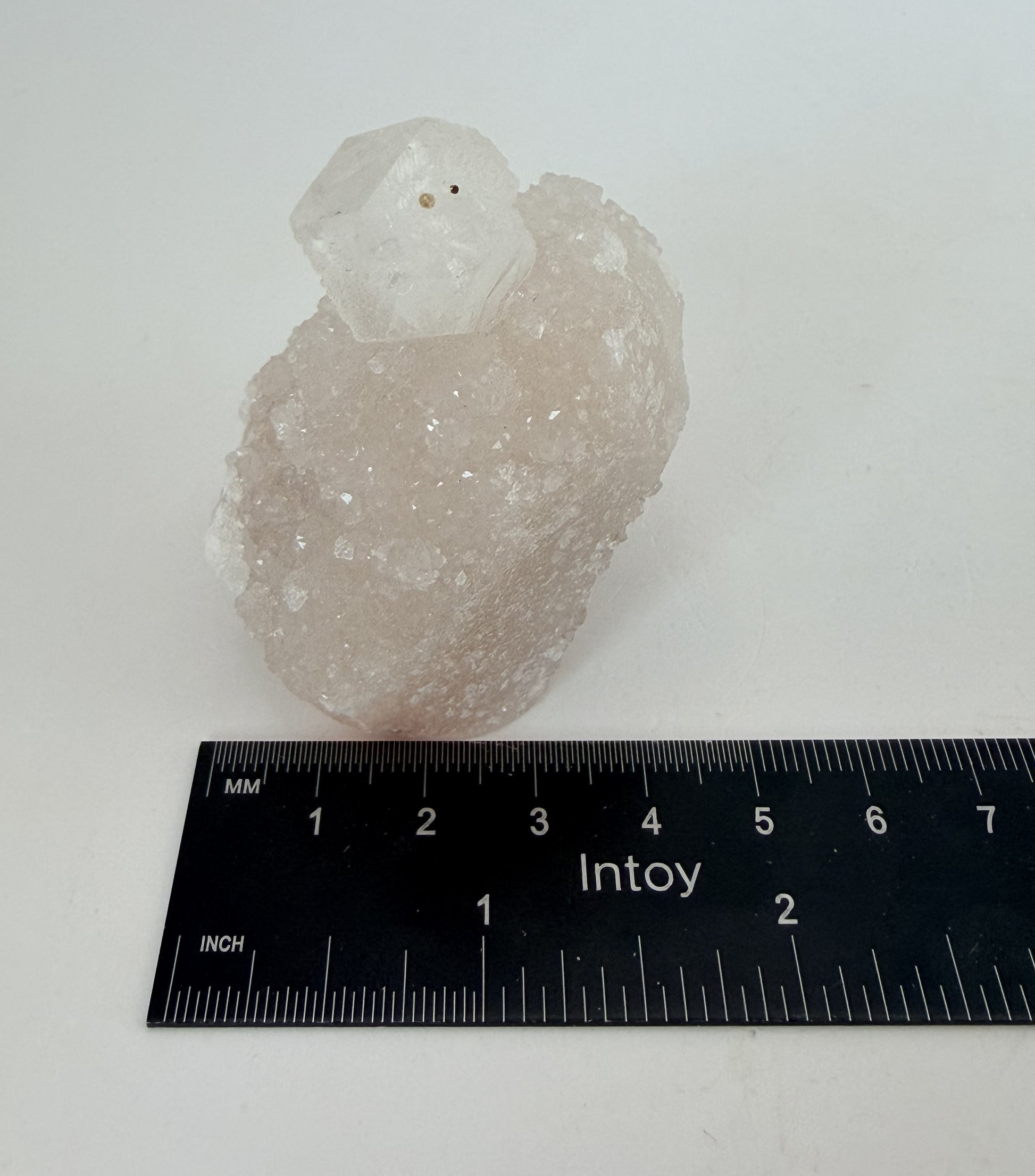 White apophyllite cluster with clear terminated crystal