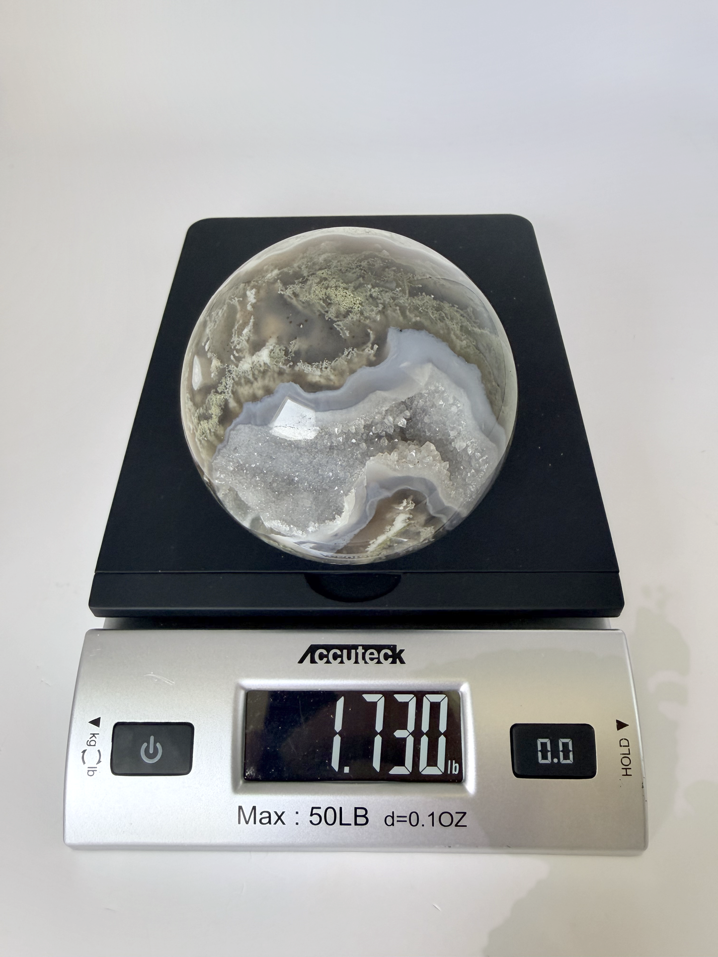 Moss Agate Sphere with Druzy Geode Pocket, 3.3 Inch Polished Crystal Ball with Green Moss Inclusions and Sparkling Quartz Cave