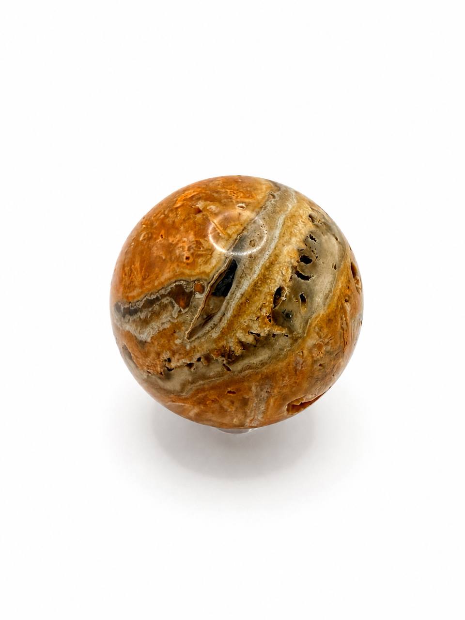 Lace Agate Crystal Sphere, top angle on clear stand