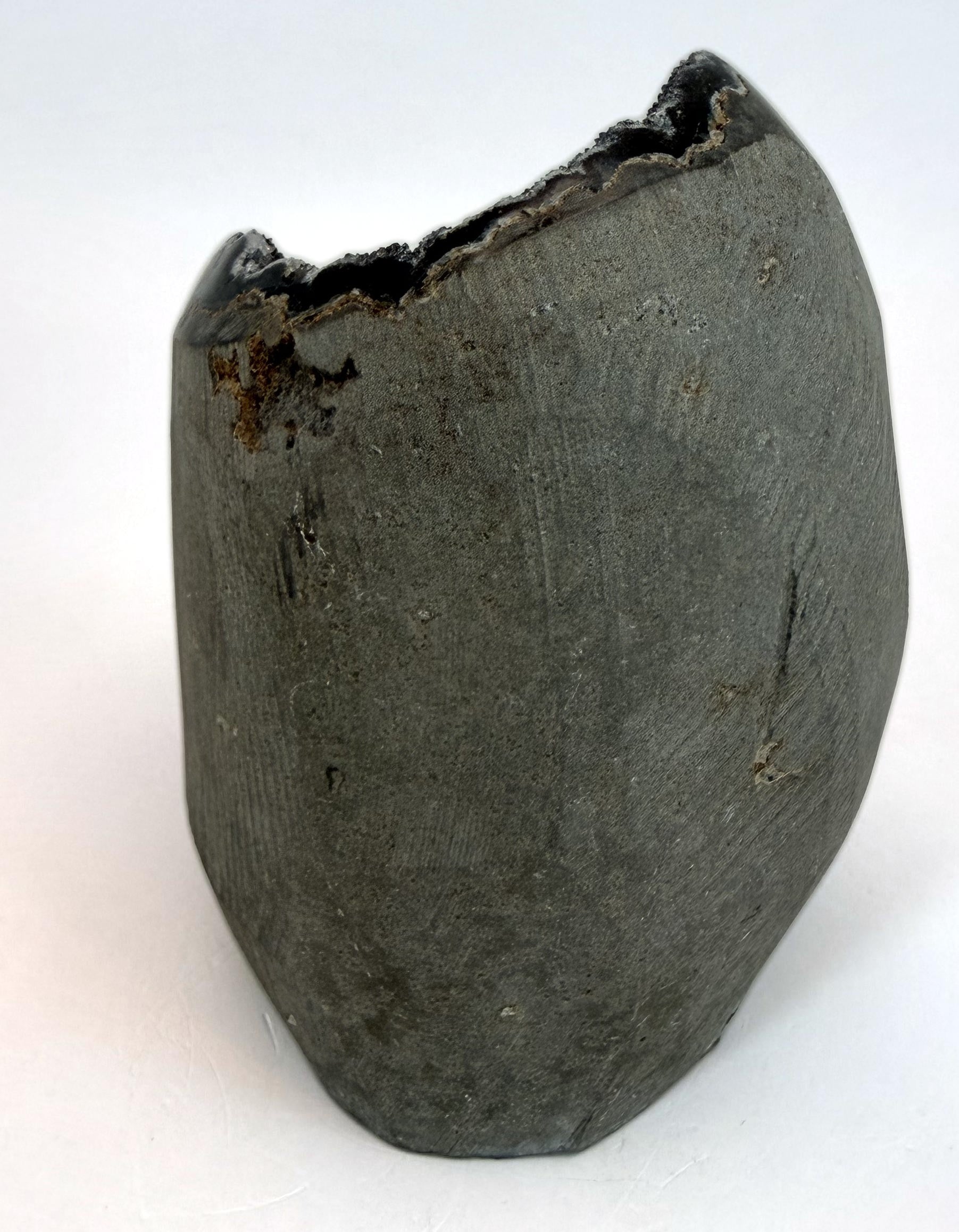 Back of the geode, the natural gray rock it grew inside