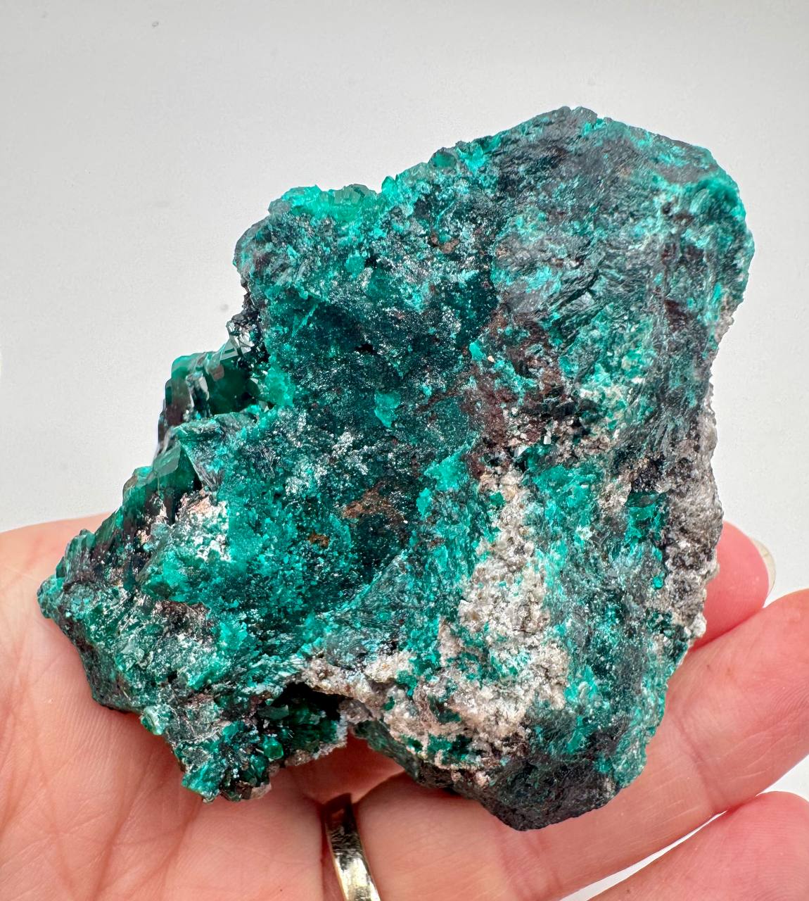 Dioptase crystal specimen dark side view