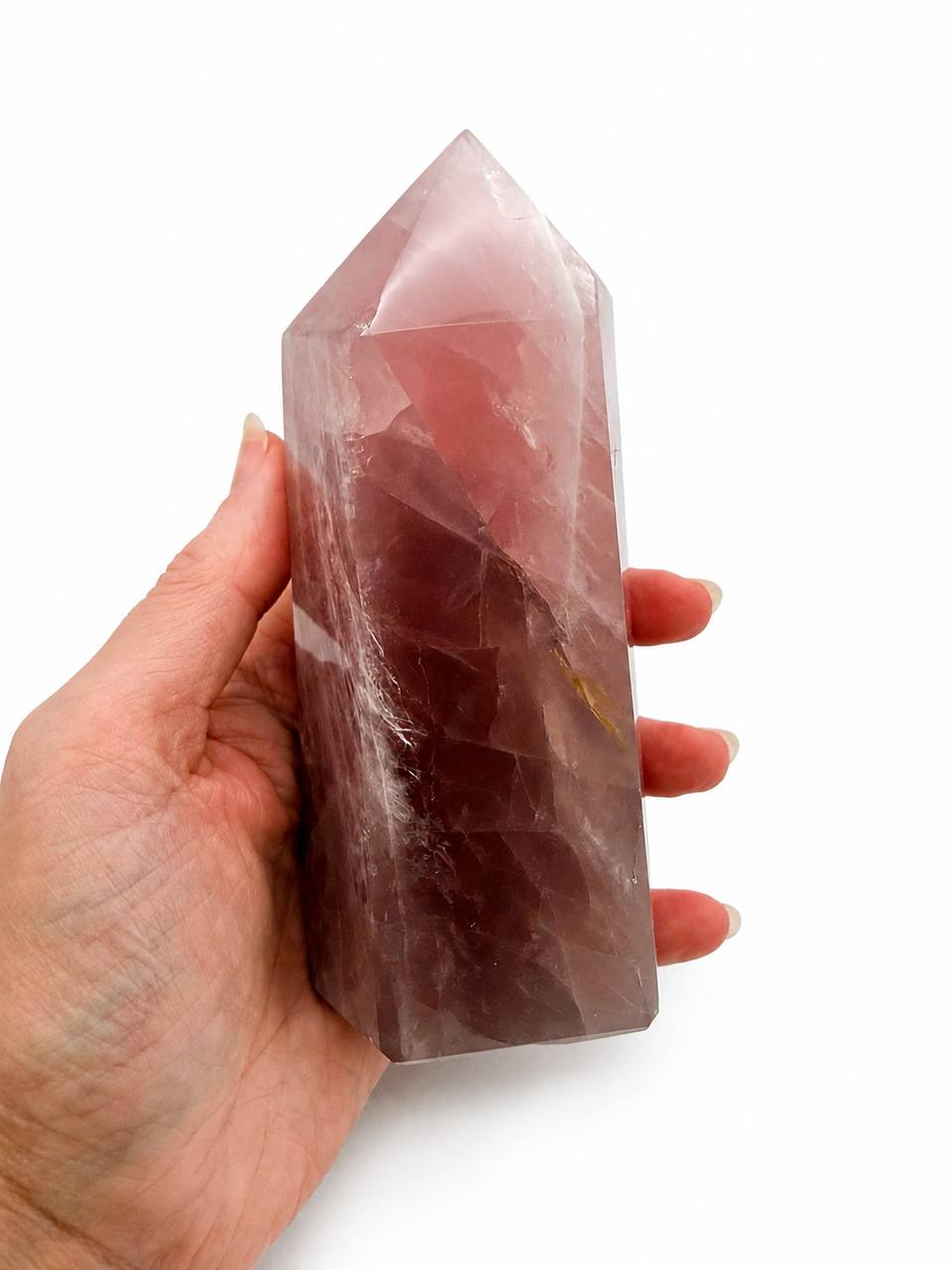 Rose Quartz Tower - hand held showing size and deep mauve color