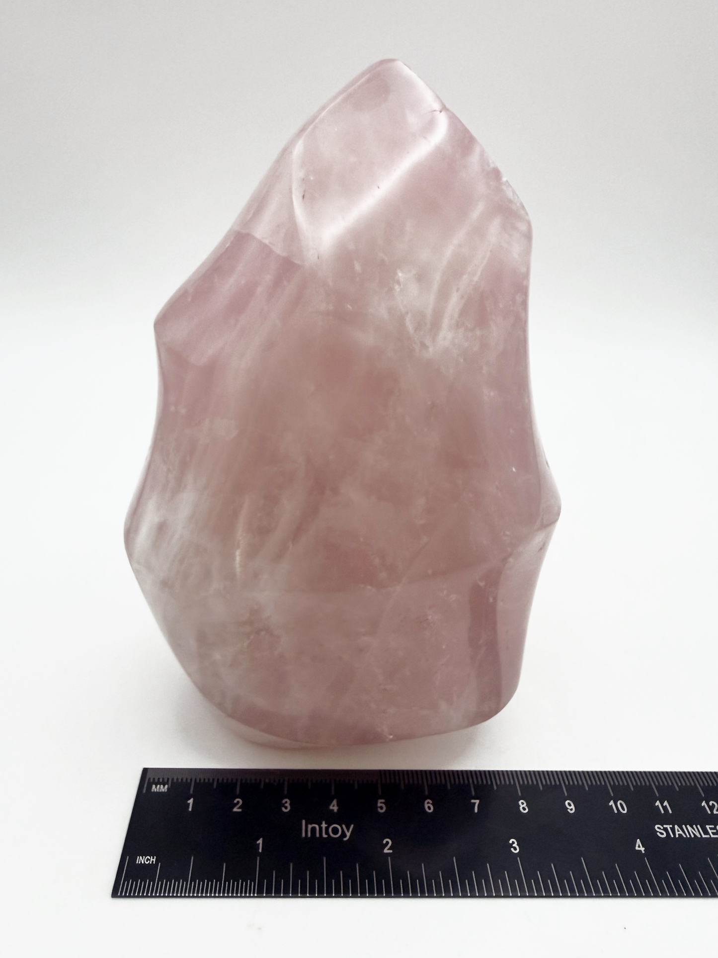 Large rose quartz flame, polished pink quartz freeform