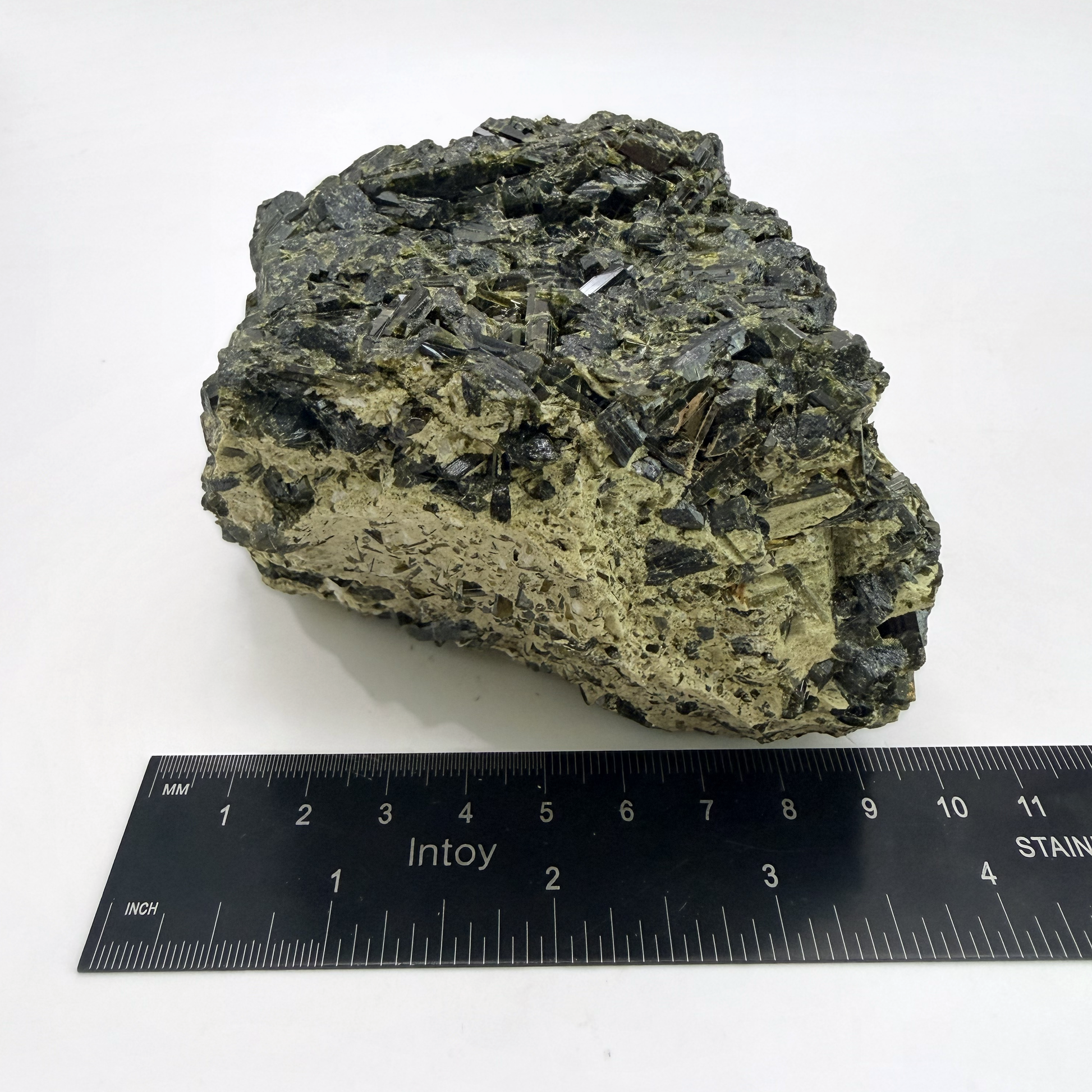 Epidote specimen with bladed green crystals