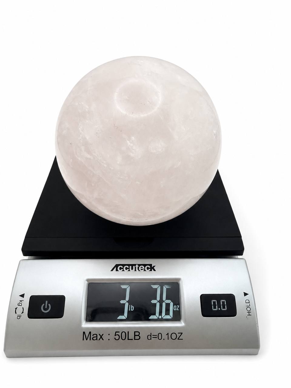 Rose Quartz Sphere weight 3 lbs 3.6 oz on scale