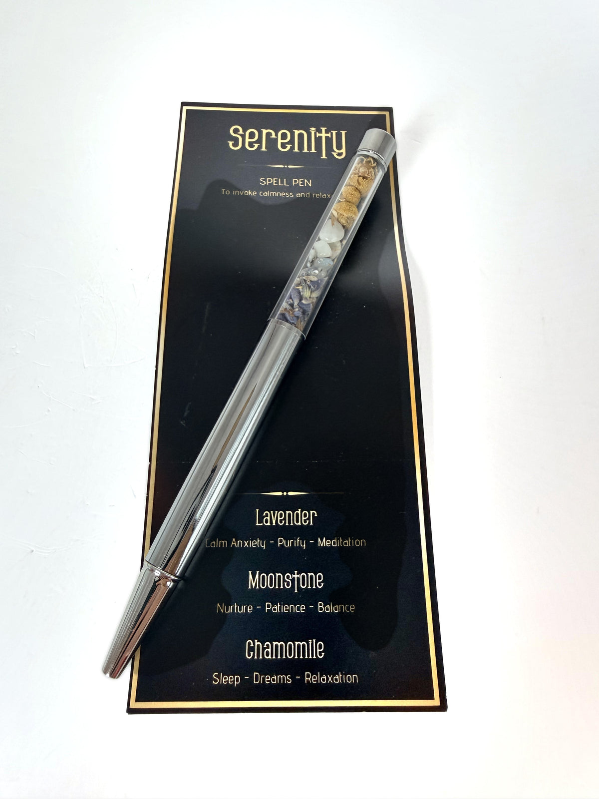 Serenity crystal pen with lavender, moonstone and chamomile on its printed card
