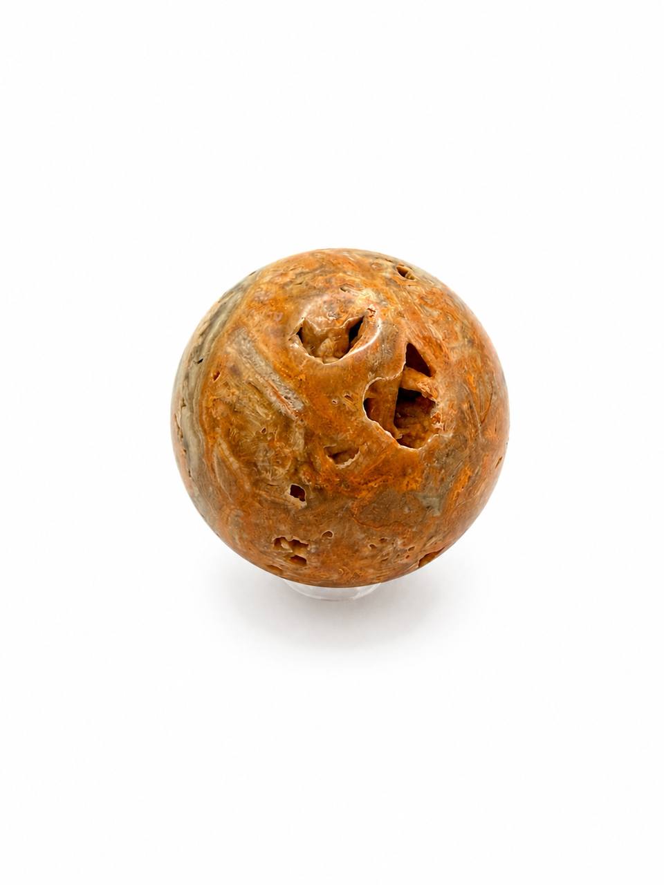 Lace Agate Crystal Sphere, showing natural vugs and cavities