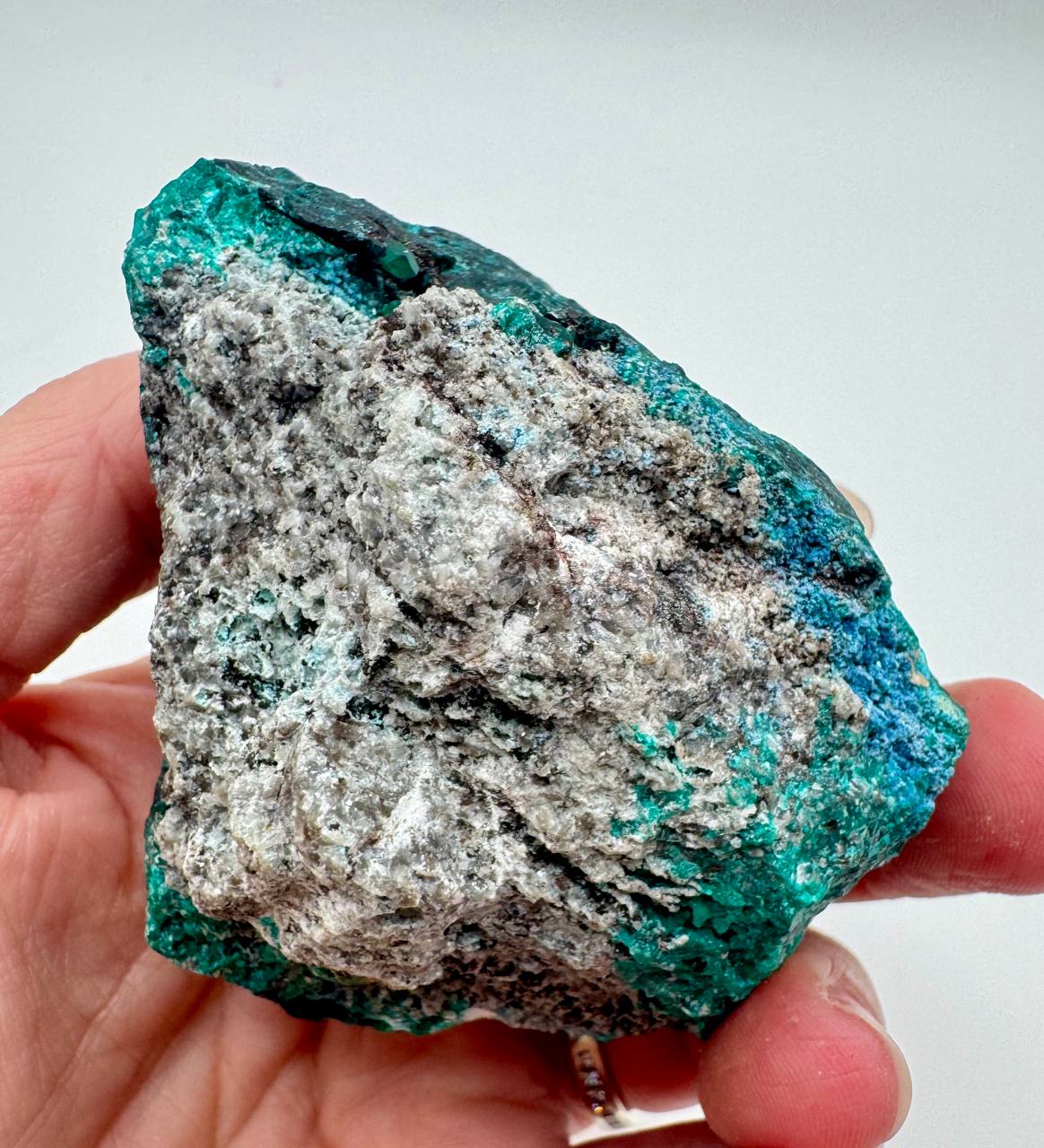 Dioptase crystal specimen back showing white matrix