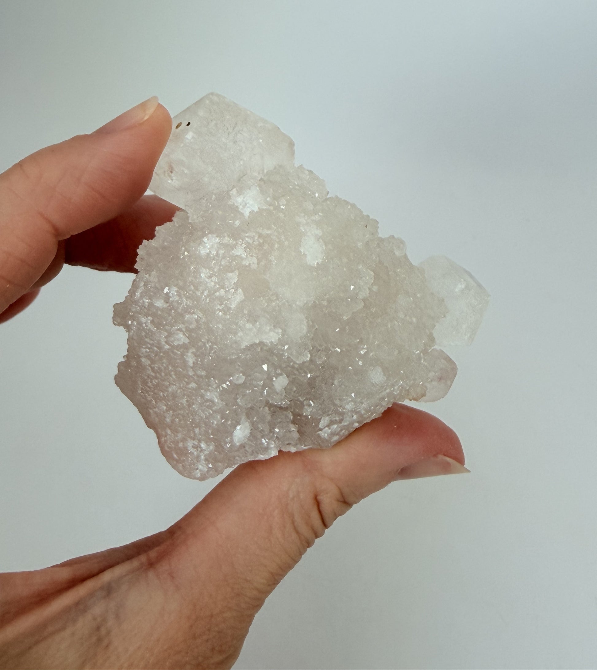 White apophyllite cluster with clear terminated crystal