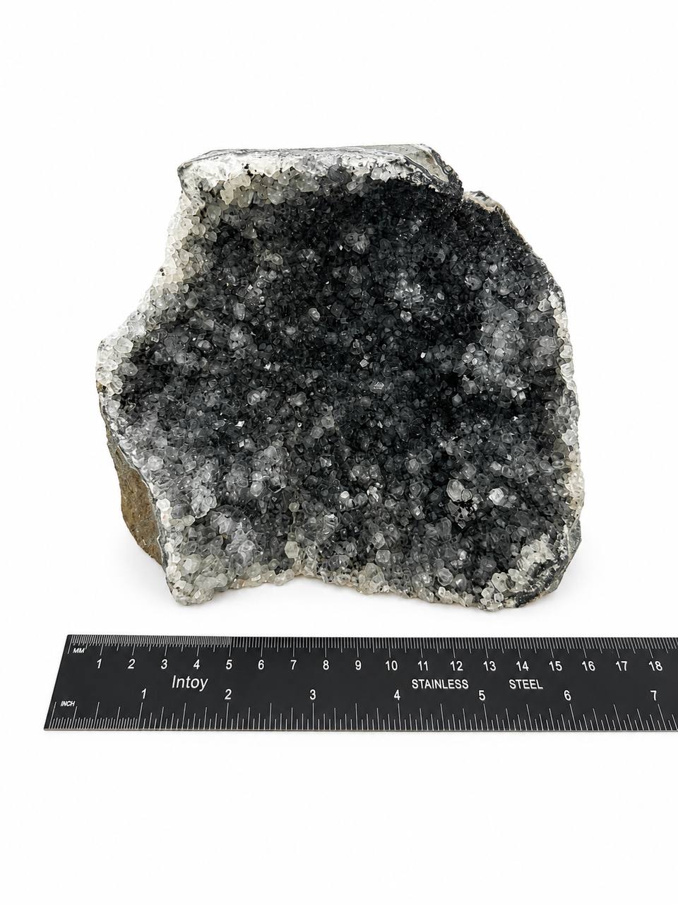Black amethyst druzy cluster, self standing, charcoal grey crystals with white rim