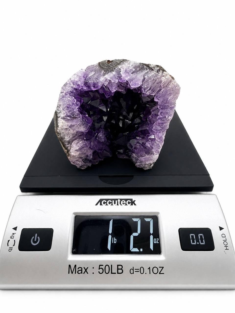 Uruguay Amethyst Geode Cave, weight 1 lb 2.7 oz on scale