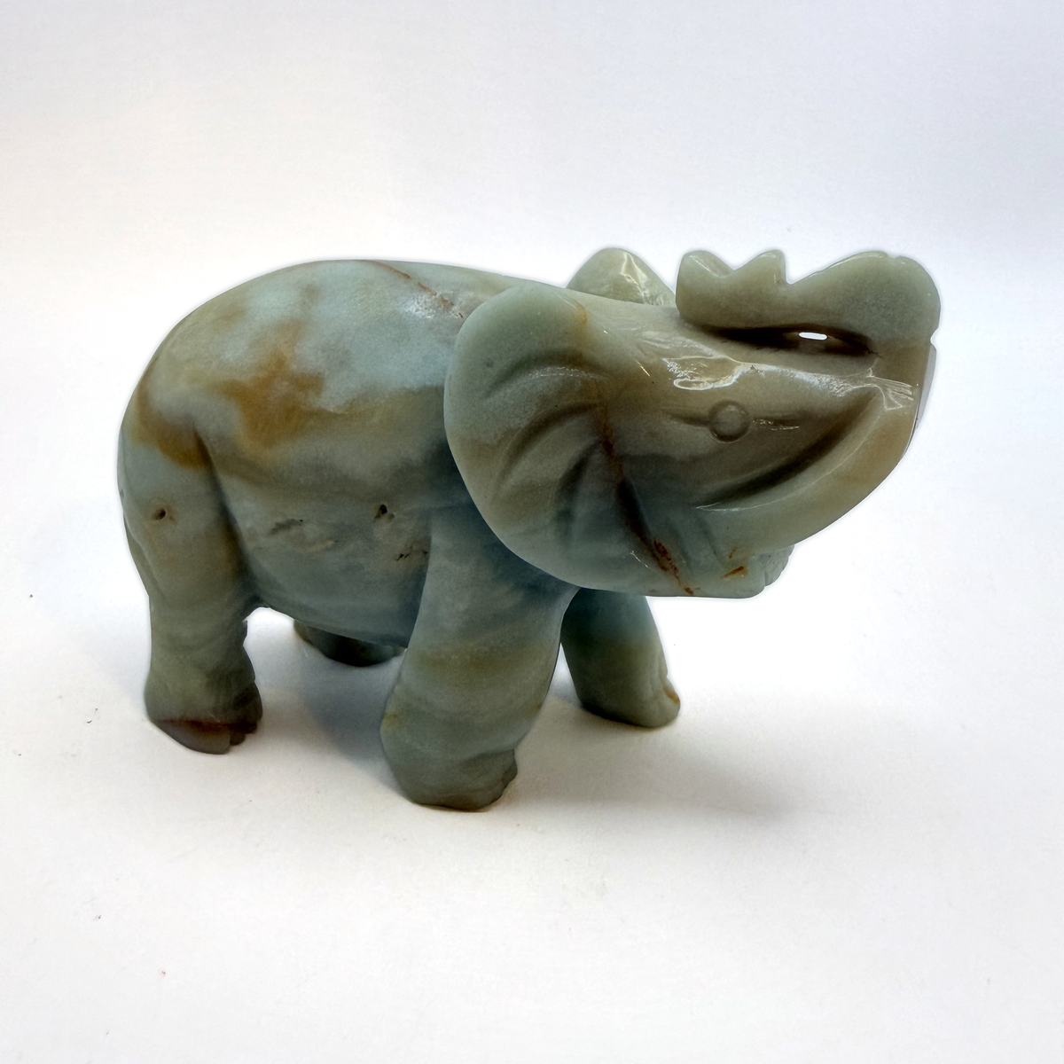 Side of the carved elephant showing the caramel banding