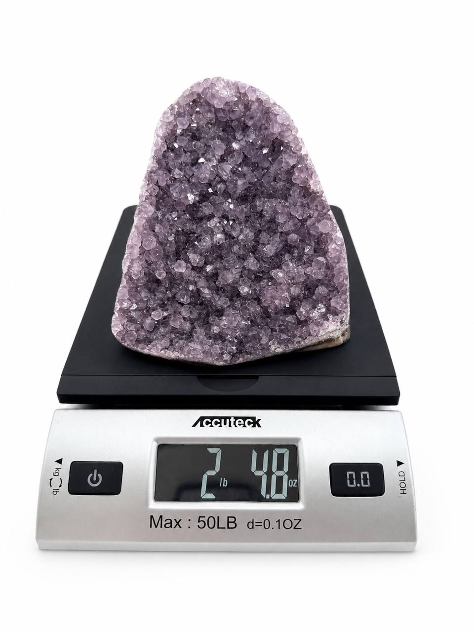 Lavender amethyst cluster on scale showing 2 lb 4.8 oz