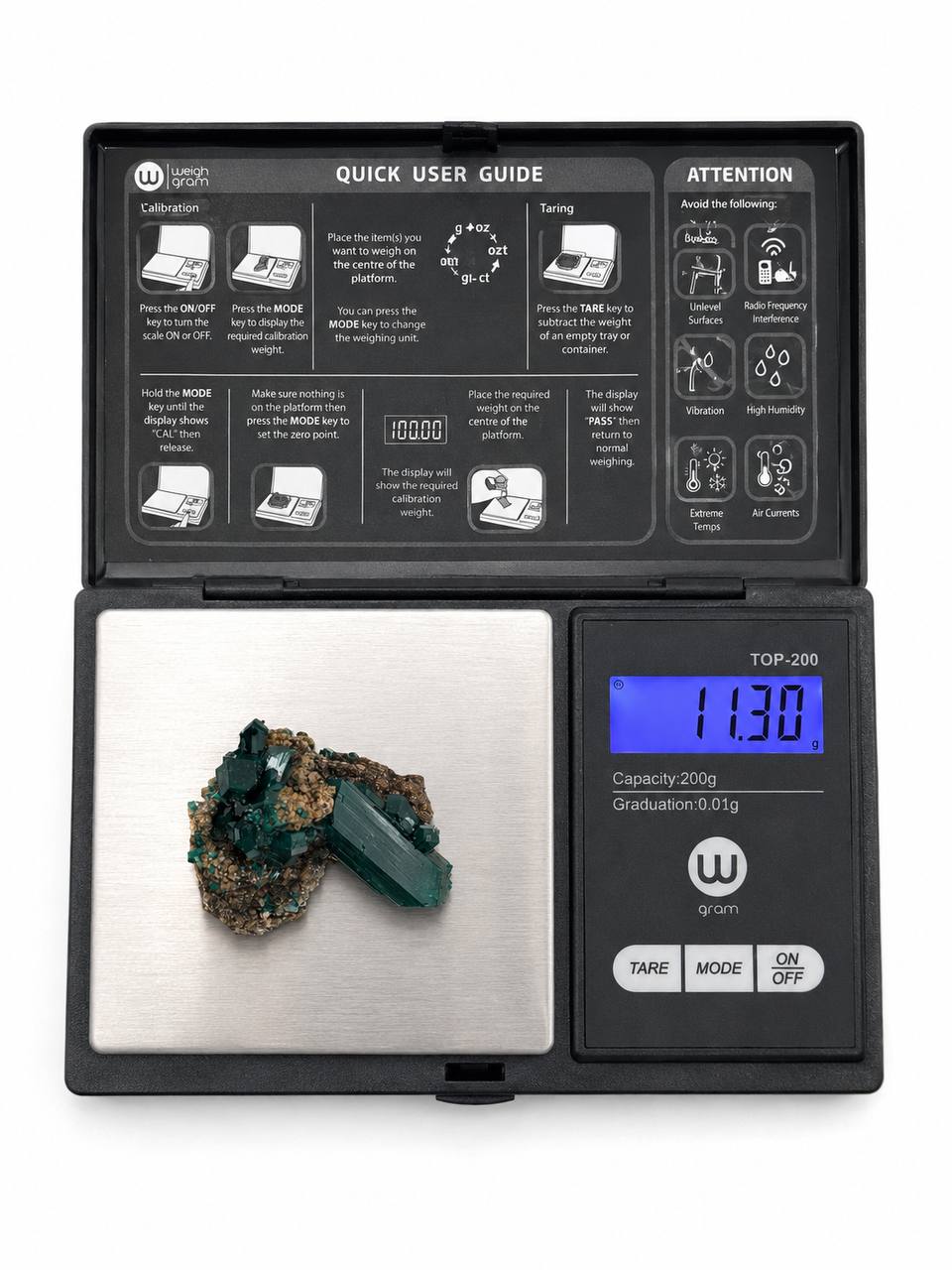 Dioptase crystal blade on gram scale showing 11.30g