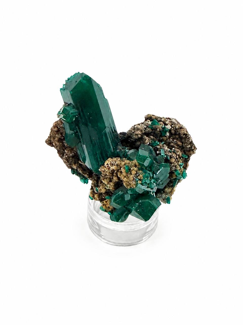 Dioptase crystal blade on acrylic pedestal stand white background