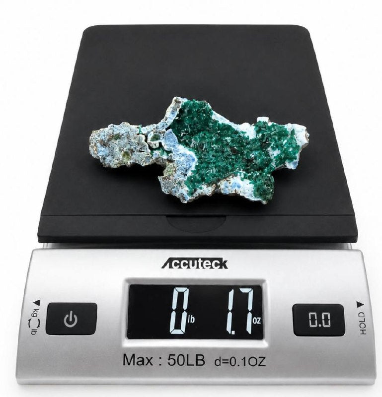 Dioptase plate on scale showing 1.7 oz