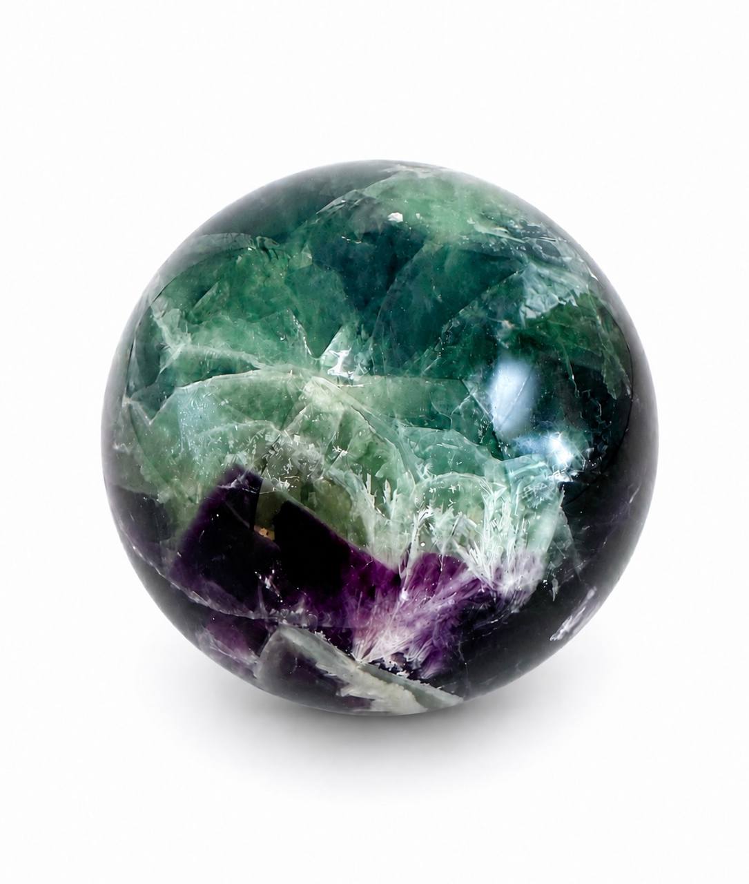 Rainbow fluorite sphere front view showing green and purple zones