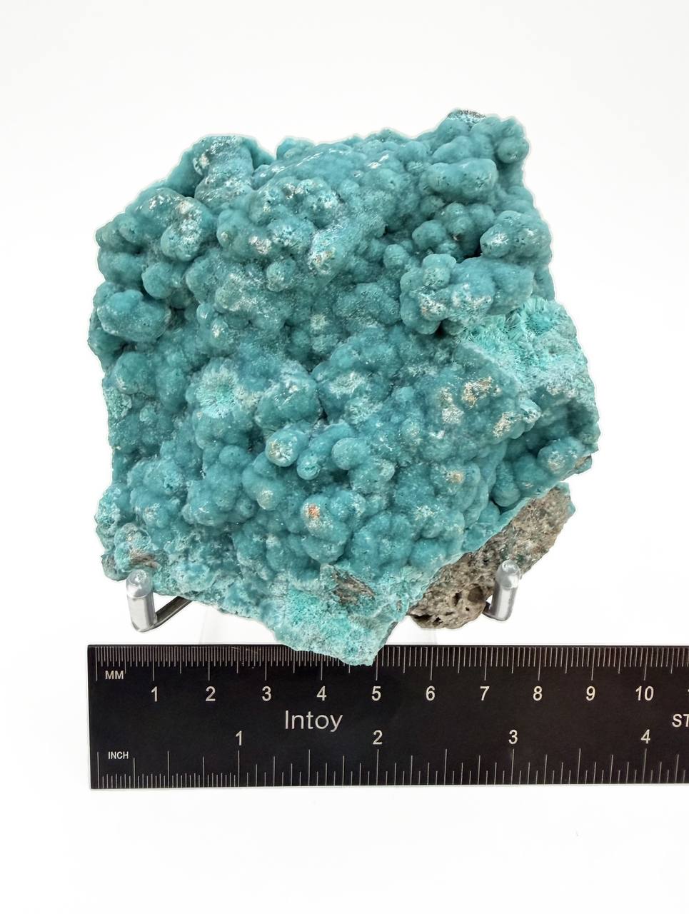 Teal hemimorphite specimen front view with ruler showing 3.5 inch width