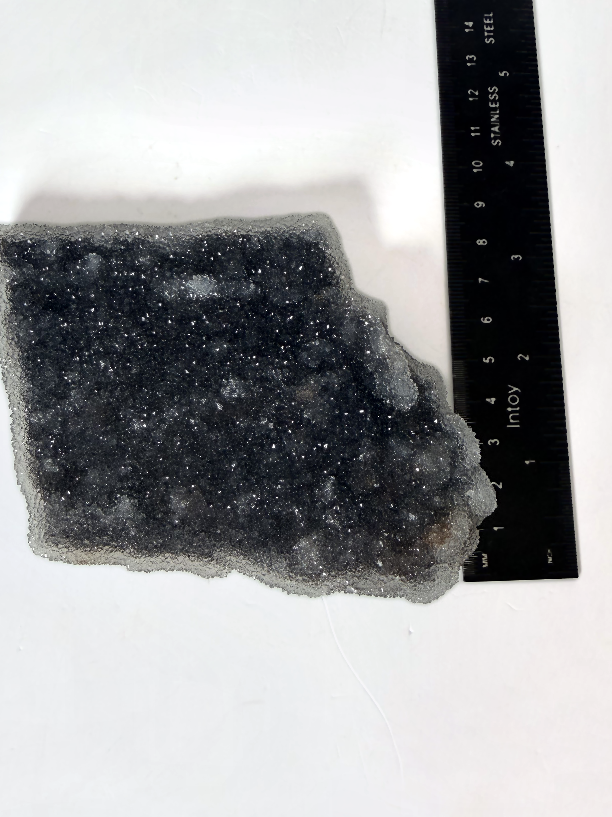 Amethyst druzy plate with a ruler, vertical