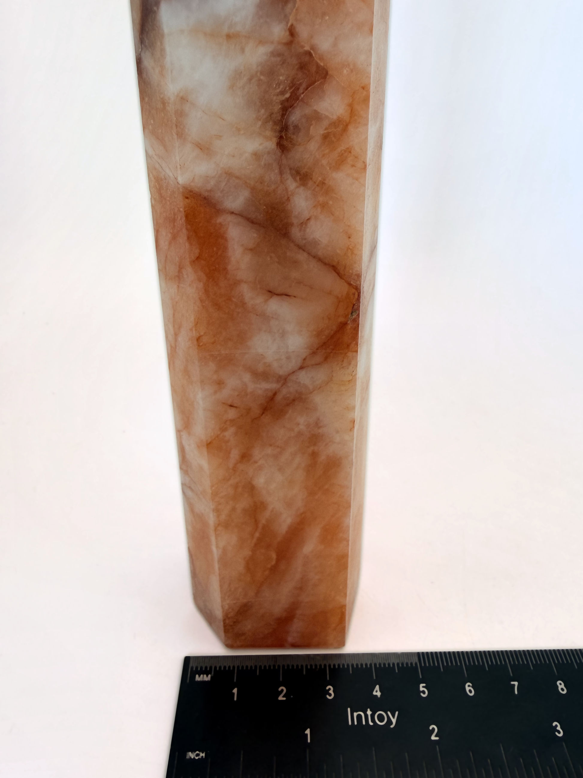 Fire quartz tower detail with a ruler