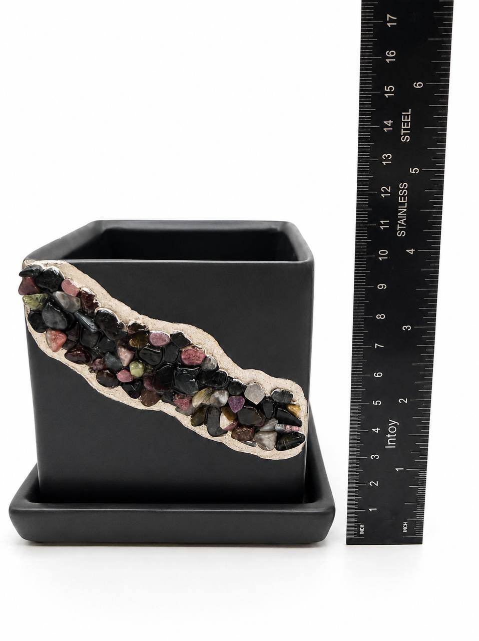 Tourmaline crystal planter with ruler showing height