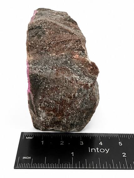 Pink cobaltoan calcite back view showing raw natural matrix