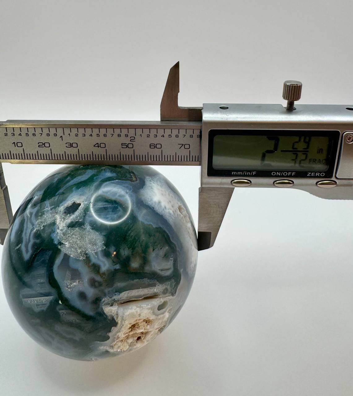 Moss agate sphere diameter measurement approximately 2.75 inches