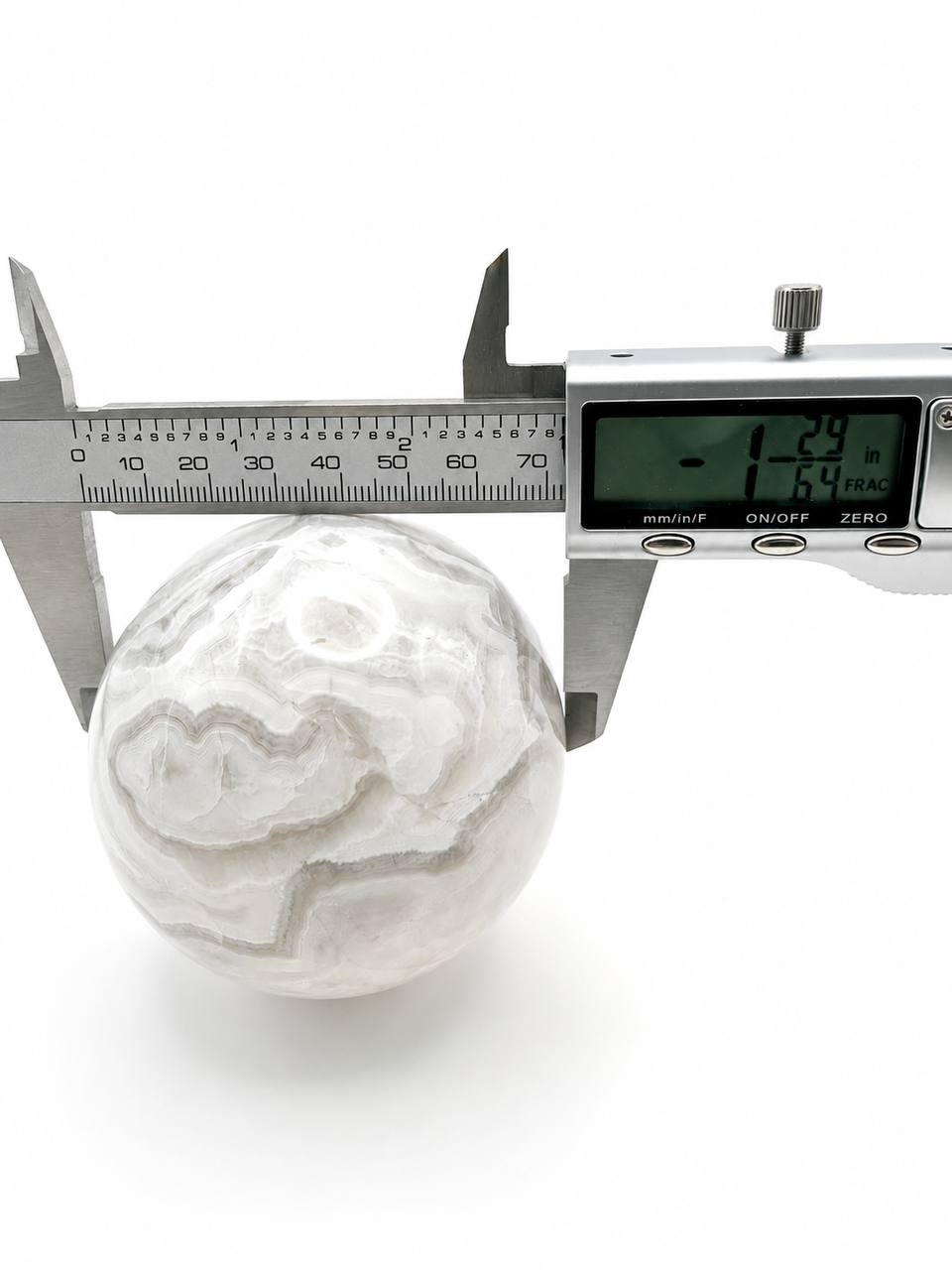 Grey banded onyx sphere 1.29 inch diameter measurement