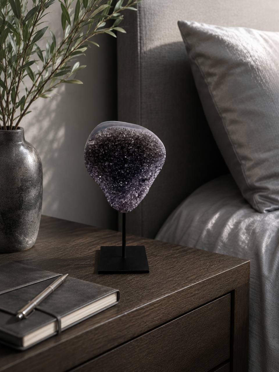 Dark amethyst druzy on nightstand lifestyle