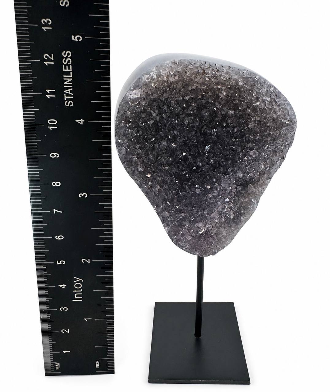 Dark amethyst druzy height with ruler showing 5 inches